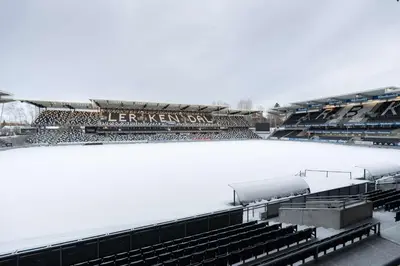 a stadium covered in snow with a hockey rink at Scandic Lerkendal in Trondheim