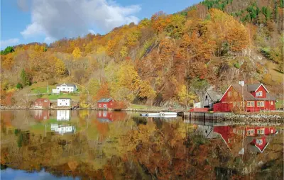 a village on the shore of a body of water at Gorgeous Home In Åkra With Wifi in Åkra