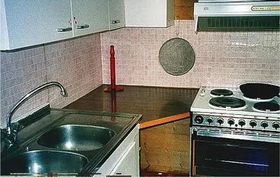 a kitchen with a sink and a stove at Holiday Home Sørbøvåg Sandnes in Sandnes
