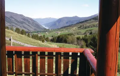 a view of a valley from a wooden balcony at Stunning Home In Vik I Sogn With Wifi in Espeset