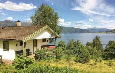 a house with a view of a lake at Holiday Home Balestrand Stokkabø in Balestrand