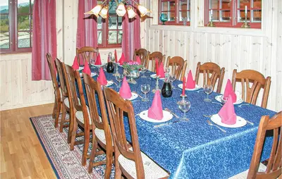 a table with pink party hats on top of it at Stunning Home In Sogndal With Sauna in Sogndal