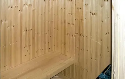 a wooden wall with a wooden bench in a room at Holiday Home Gålå Peer Gyntlia in Gålå