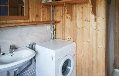 a washing machine in a bathroom with a sink at Beautiful Home In Hemsedal With Kitchen in Hemsedal