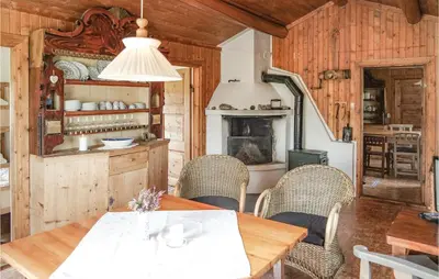 a dining room with a table and chairs at Beautiful Home In Hemsedal With Kitchen in Hemsedal