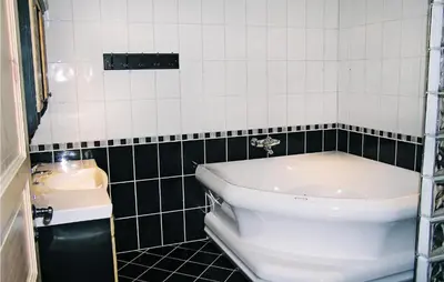 a bathroom with a toilet and a sink at Holiday Home Hemsedal Høgeloft Ii in Hemsedal