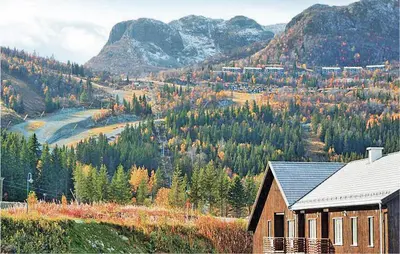 a house on top of a hill with a mountain at Nice Apartment In Hemsedal With Sauna in Hemsedal