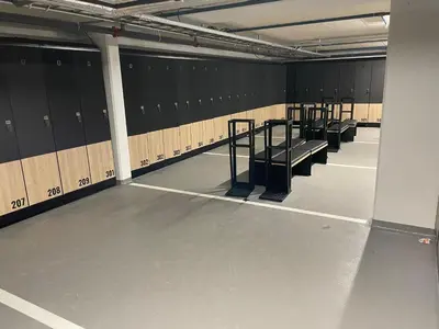 a row of benches in a locker room at Trysil Alpine Lodge in Trysil