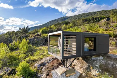 a tiny house sitting on top of a mountain at Sogndal Fjordpanorama - The view in Sogndal