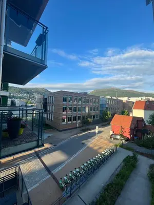 a view from the balcony of a building at Modern Apartment - Amazing Terrace and Fjord View, Close to City Center in Bergen