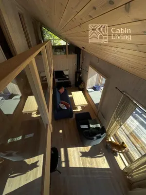 an overhead view of a living room in a tree house at New large cabin Ski in out Sjusjøen & sauna in Ringsaker