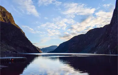 a view of a lake between two mountains at 4 Bedroom Gorgeous Home In Erfjord in Erfjord