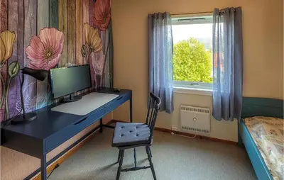 a bedroom with a desk with a computer and a window at Gorgeous Home In Reksteren With Kitchen in Hope