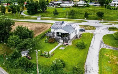 an aerial view of a house with a driveway at Gorgeous Home In Vestnes With Wifi in Vestnes