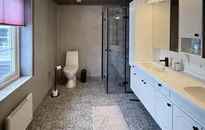 a bathroom with a toilet and a sink and a shower at Lovely Home In Trysil With Wifi in Trysil