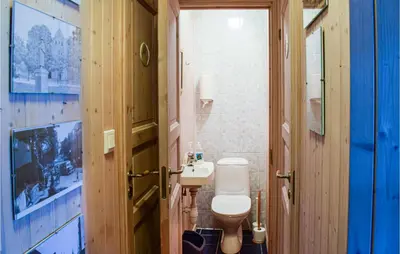a bathroom with a toilet and a sink at 10 Bedroom Lovely Home In Østre Gausdal in Vestre Gausdal