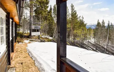 a view from the porch of a house with snow at 4 Bedroom Stunning Home In Vinstra in Vinstra