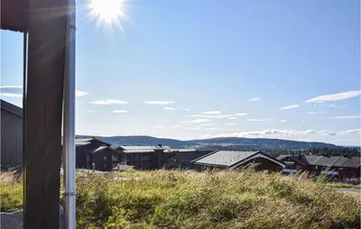 a view of a city from a house at Nice Home In Sjusjøen With Kitchen in Sjusjøen