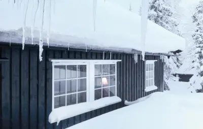a house with a window in the snow at Nice Home In Sjusjøen With Wifi in Sjusjøen