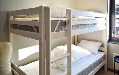 a bunk bed room with two bunk beds at Leil 70 in Sjusjøen