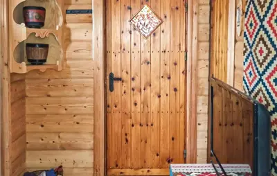 a door in a log cabin with at Stunning Home In Uvdal With Wifi in Uvdal