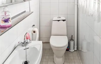 a white bathroom with a toilet and a sink at Stunning Home In Uvdal With Wifi in Uvdal