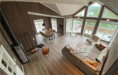 an overhead view of a living room with a couch and a table at Beautiful Home In Rødberg in Rødberg