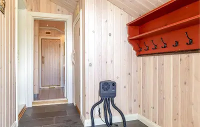 a room with a speaker in the corner of a room at Nice Home In Hemsedal With Sauna in Hemsedal