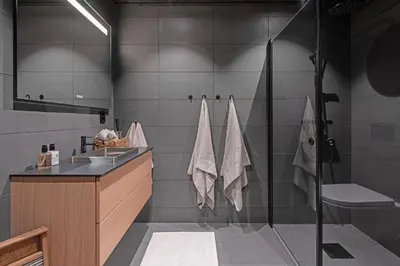 a bathroom with a shower and a sink at Kikut Alpine Lodge 9103 in Geilo