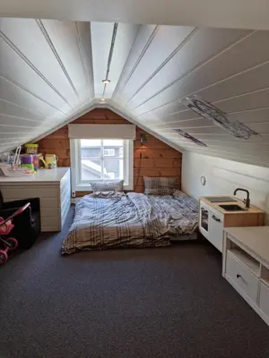 a bedroom with a bed in a room at Fosskamben Panorama Sogndal in Sogndal