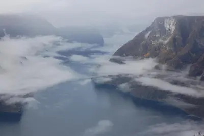 an aerial view of a river in the middle of a mountain at Reinunga Eco Hytta - Mountain lodge near Myrdal accessible only by train or bike in Myrdal