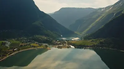 an aerial view of a lake in a mountain valley at Skjolden Resort in Skjolden