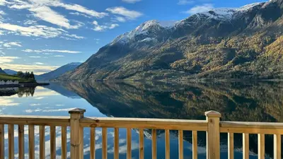 a view of a lake with mountains in the background at Skjolden Resort in Skjolden