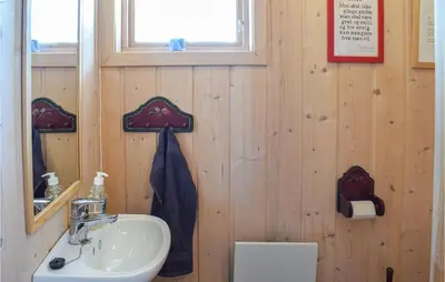 a bathroom with a sink and a toilet at Sjusjøvegen 1892 in Sjusjøen