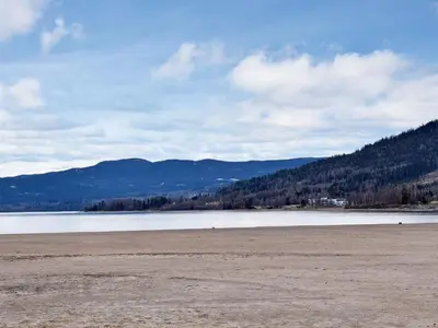 a large body of water with mountains in the background at 8 person holiday home in HURDAL-By Traum in Hurdal