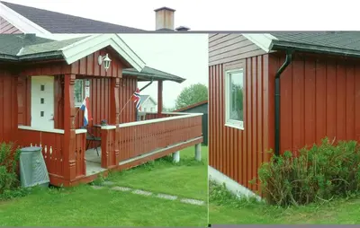 a red house with a porch and a deck at Gorgeous Home In Svingvoll With Wifi in Svingvoll
