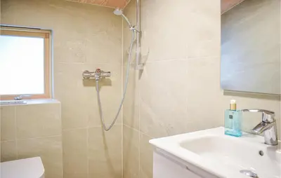a bathroom with a shower and a sink at 3 Bedroom Amazing Home In Skjold in Skjold