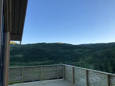 a view from the balcony of a house at Høgerinden Lodge in Sogndal