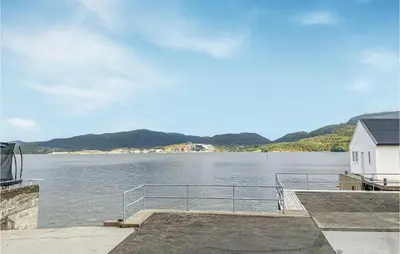 a view of a large body of water with a house at Cozy Home In Kristiansund With Wifi in Kristiansund