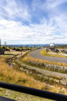 a view of a road from a vehicle at Mosetertoppen Skiline - Hafjell Ski Resort in Øyer