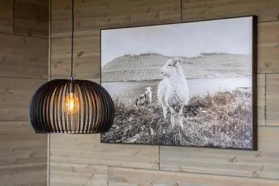 a picture of a sheep hanging on a wall at Mosetertoppen Skiline - Hafjell Ski Resort in Øyer