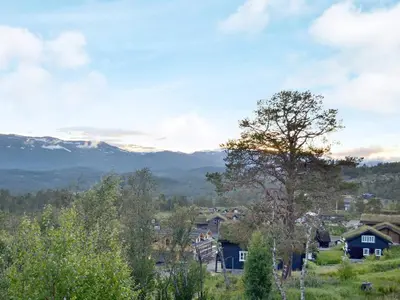 a view of a town with mountains in the background at 5 person holiday home in Rauland-By Traum in Rauland