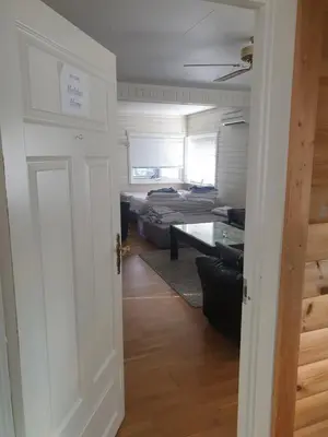a room with a door leading to a living room at Holiday Home in Gol