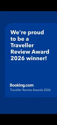 a blue screen with a text box that says were proud to be a traveller at Sanderstølen Hytte in Tisleidalen