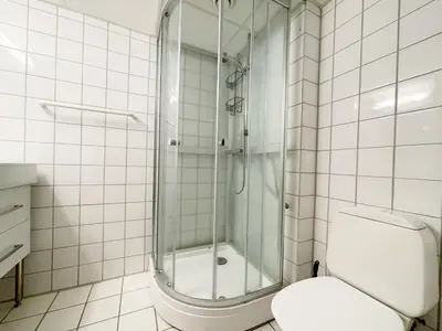 a bathroom with a shower and a toilet at Actif 329 - apartment by Ål skisenter in Ål