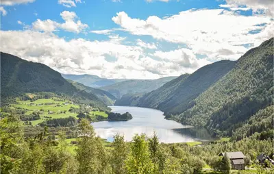 a view of a river in a valley with mountains at Beautiful Home In Vossestrand With Wifi in Vossestrand