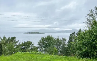 a view of a body of water with trees at 1 Bedroom Amazing Apartment In Øydegard in Aspa