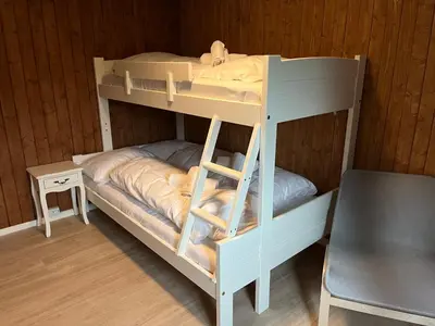 a couple of bunk beds in a room at Nørdre-Repp in Boverdalen