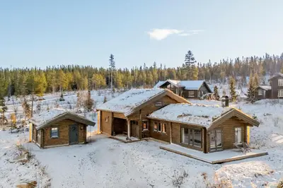 an aerial view of a log cabin in the snow at Trysilsetra 35 in Trysil