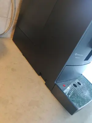 a laptop computer sitting on top of a table at Guest room in private house in Ålesund